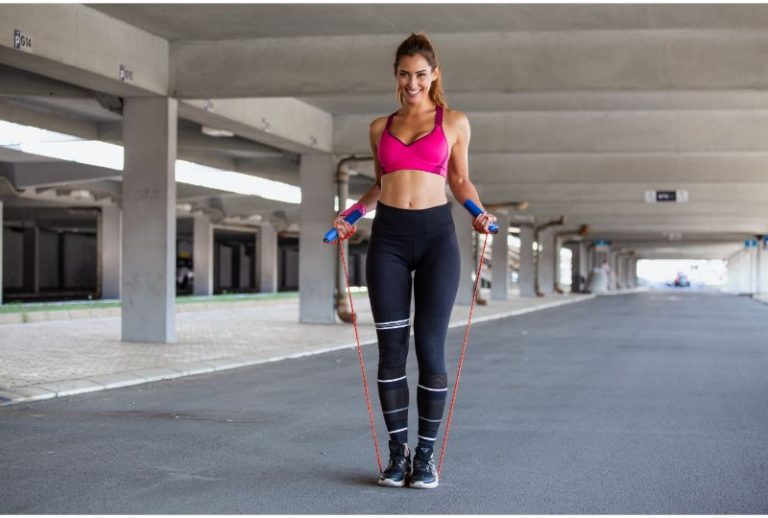 Woman Exercises with Jump / Skipping Rope