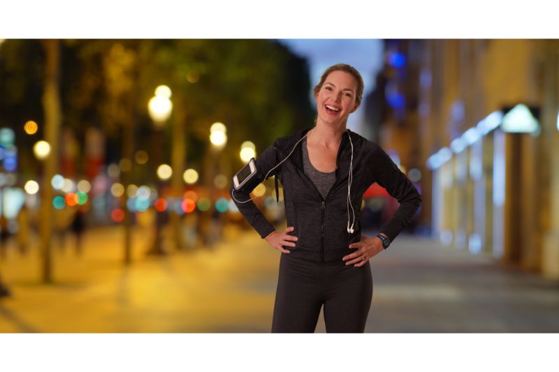 healthy female jogger in the city at night